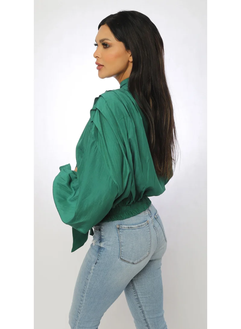 توترندس بلوزة اخضر واسعة وخصر مطاطي